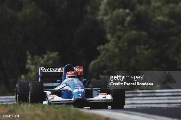 Erik Comas of France drivesf the Ligier Gitanes Blondes Ligier JS37 Renault V10 during practice for the Formula One Hungarian Grand Prix on 15th...