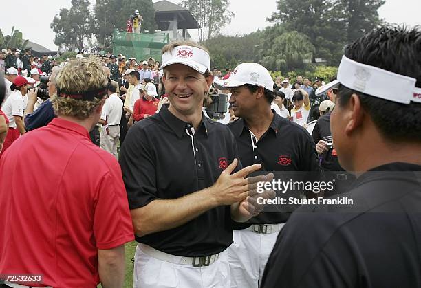 Retief Goosen, Captain of The International team looks happy during the second day of The Goodwill Trophy at Mission Hills Golf Club on November 14...