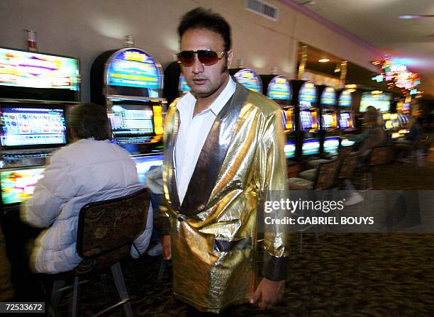 Las Vegas, UNITED STATES: Rocky Gobrait, age 32, from Tahiti, French Polynesia leaves the hotel after his defeat in the final of the Elvis Presley...