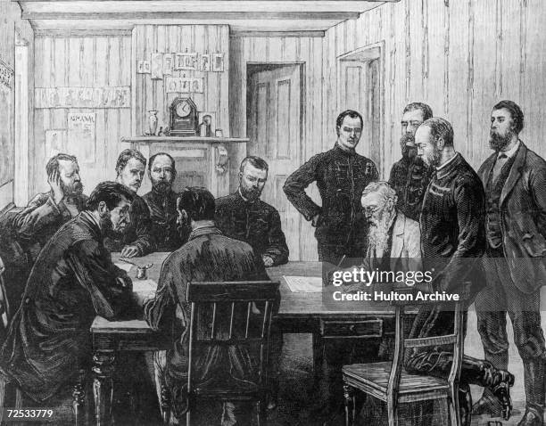 The signing of an armistice agreement at O'Neill's Farm at the end of the First Boer War, March 1881. Behind , Swart Dirk Uys, Lieutenant Hamilton,...