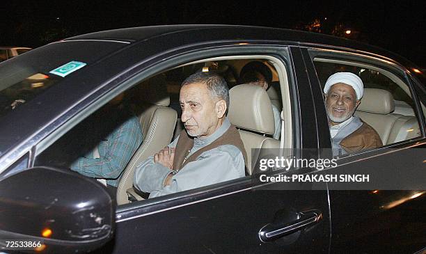 Leaders of the Indian Kashmiri separatist All Parties Hurriyat Conference Professor Abdul Ghani Bhat and Maulana Abbas Ansari arrive at the residence...