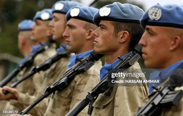 Belgian UN troops of honor receive their Defense Minister Andre Flahaut inside their base in the village of Tebnin, 14 November 2006. Belgium has...