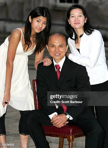 Shoe designer Jimmy Choo poses with his wife Rebecca Choo and daughter Emily Choo after he received the Freedom of the City of London award November...