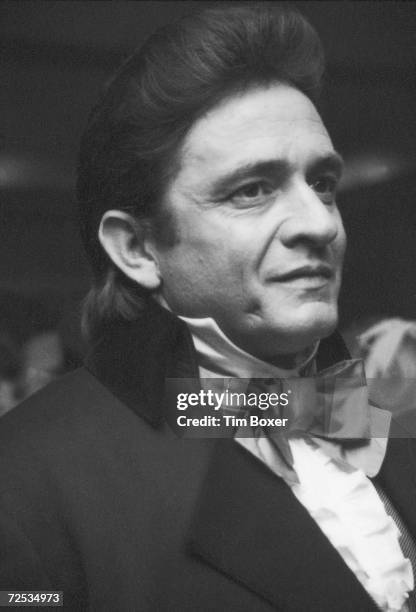 American country music performer Johnny Cash wears old-fashioned formal attire to the Bob Hope Benefit for Eisenhower Medical Center, given at the...