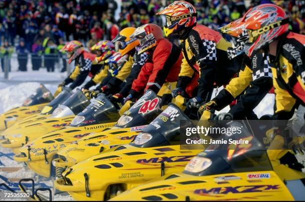 Kent Ipson gets ready at the start during the Snow Cross Semi Pro 600 race at the World Championship Snowmobile Derby in Eagle River, Wisconsin....