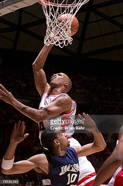 Forward Richard Jefferson of the Arizona Wildcats puts a up a shot behind guard Timmy Marks of Jackson State during the first round of the NCAA...