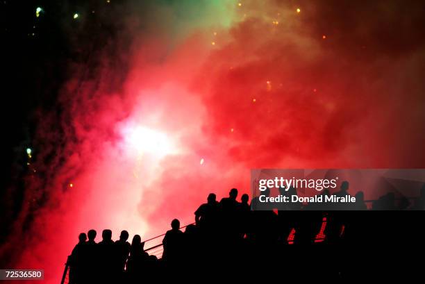 Fans watch a fireworks show at the end of the San Diego Padres v Kansas City Royals game at Petco Park on July 3, 2004 in San Diego, California.