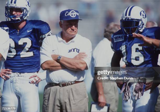 Head coach Lavell Edwards of Brigham Young University stands between his players Ronney Jenkins and Jared Kennedy during their 31-3 win over Southern...