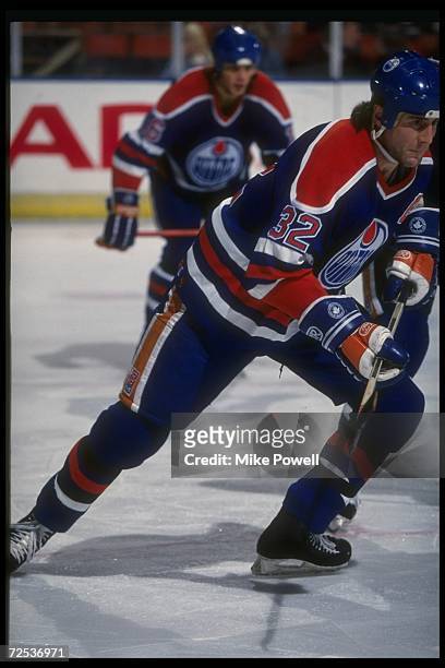 Rightwinger Dave Brown of the Edmonton Oilers moves down the ice during a game against the Los Angeles Kings at the Great Western Forum in Inglewood,...