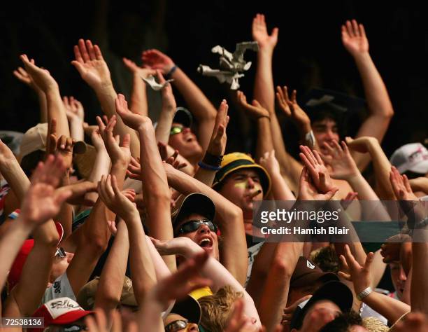 The crowd do the Mexican Wave during game one of the VB Series One Day International Tournament between Australia and the West Indies played at the...