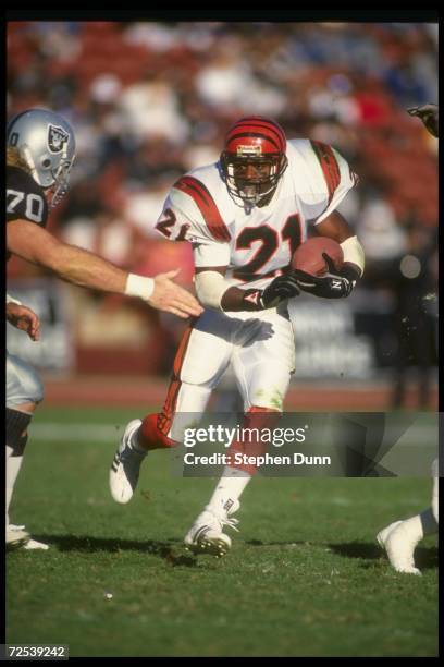 Running back James Brooks of the Cincinnati Bengals moves the ball during a game against the Los Angeles Raiders at the Coliseum in Los Angeles,...