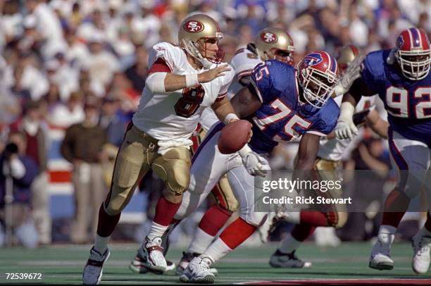 Quarterback Steve Young of the San Francisco 49ers in action during the game against the Buffalo Bills at the Bills Stadium in Orchard Park, New...