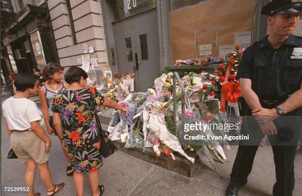 New Yorkers leave flowers in memory of John F. Kennedy, Jr.'s death outside his Manhattan apartment July 18, 1999 in New York City. This July 16th...