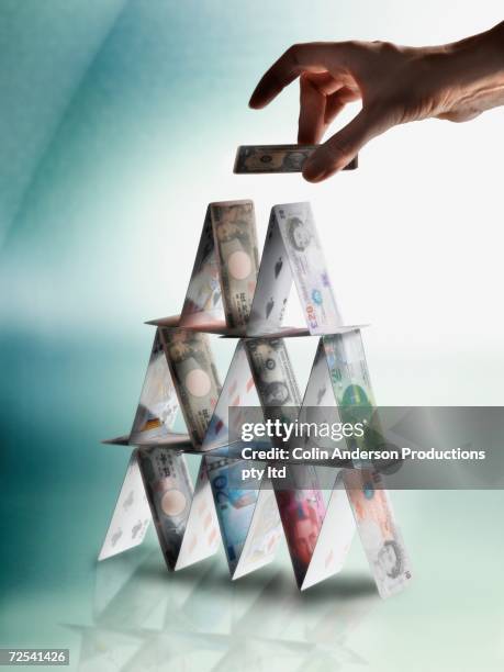 Card Stack Pyramid 310 Pyramid Of Cards Stock Photos, High-Res Pictures, and Images ...