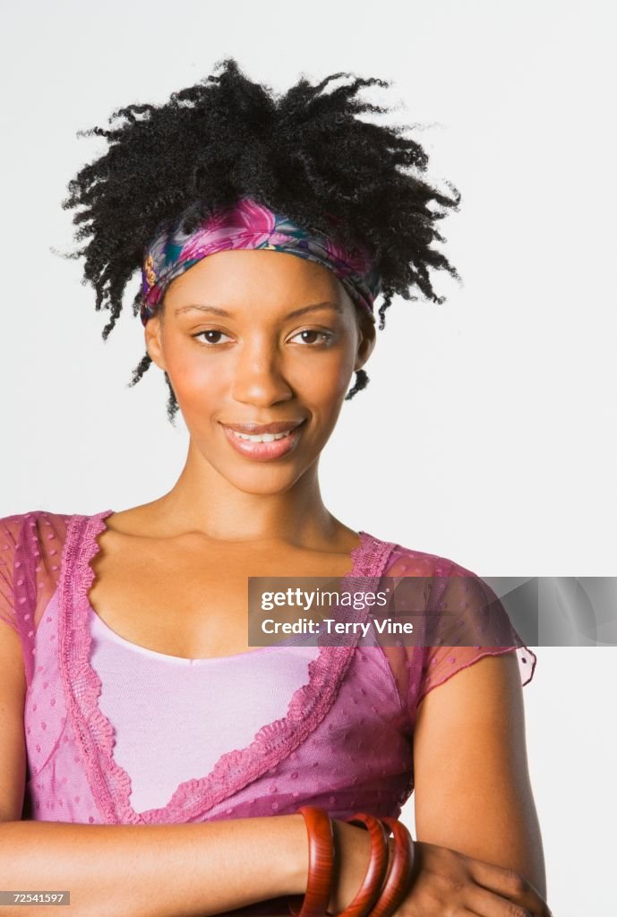 Studio shot of African woman smiling