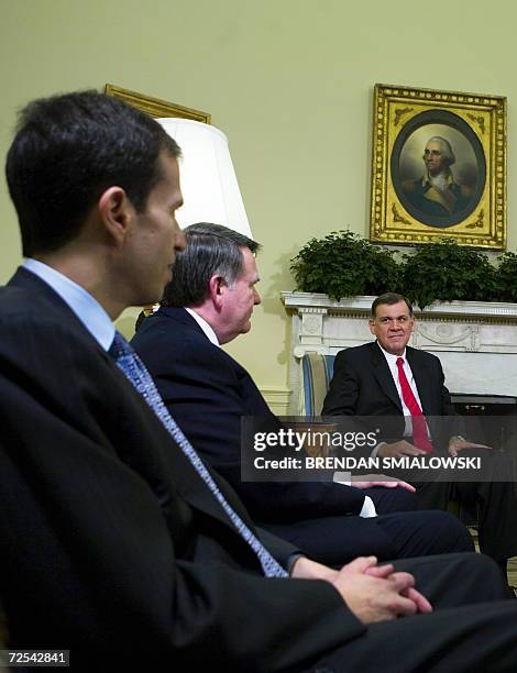 Washington, UNITED STATES: US Republican Senator from Florida Mel Martinez looks at outgoing Republican National Committee chairman Ken Mehlman and...