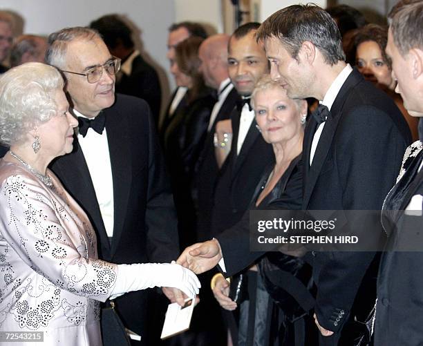 Britain's Queen Elizabeth meets Danish actor Mads Mikkelsen during the world premiere of the latest James Bond movie "Casino Royale" 14 November 2006...