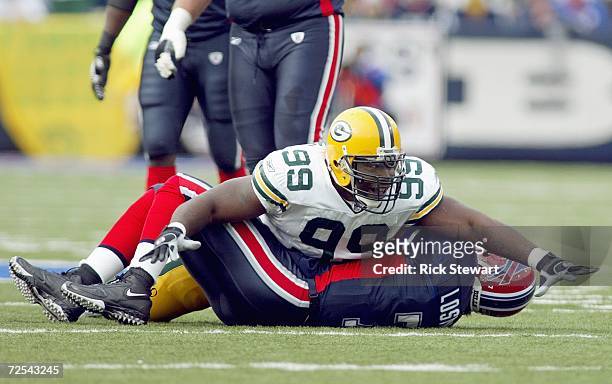 Quarterback J.P. Losman of the Buffalo Bills is sacked by Corey Williams of the Green Bay Packers on November 5, 2006 at Ralph Wilson Stadium in...