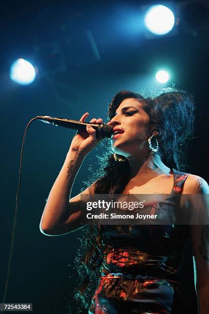 Singer Amy Winehouse performs live on stage at Koko in Camden Town on November 14, 2006 in London. England.