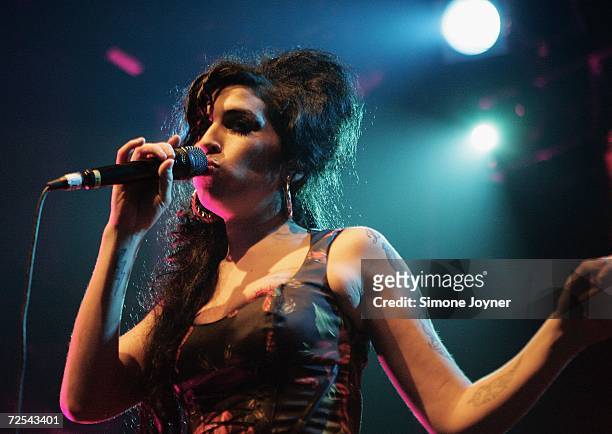 Singer Amy Winehouse performs live on stage at Koko in Camden Town on November 14, 2006 in London. England.