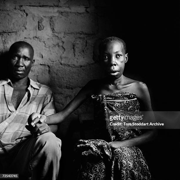 Anastasia Protas who is ill with AIDS pictured with her husband, Budaga, at their home in Mwanza, Tanzania. The couple has 5 daughters and a son, who...