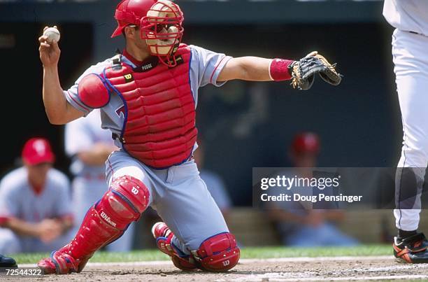 Catcher Ivan Rodriguez of the Texas Rangers ready to throw the ball from home plate during the game against the Baltimore Orioles at Camden Yards in...