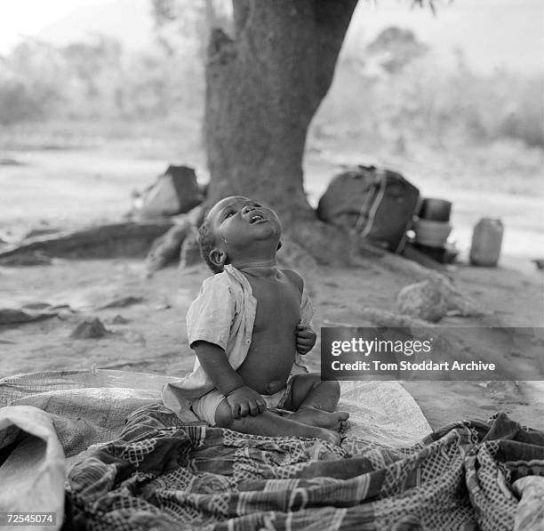 Child cries out for help in Malawi where AIDS, malaria, malnutrition and other poverty related diseases claims the lives of 100 babies in every 1,000...