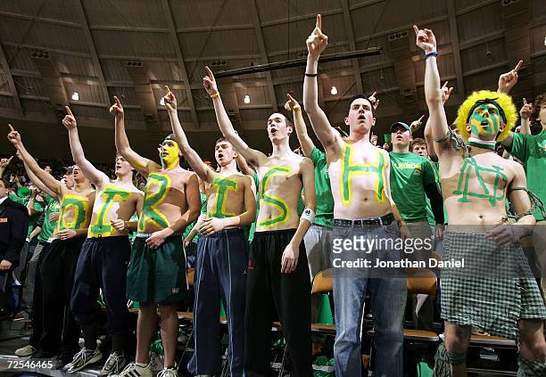 Fans of the Notre Dame Fighting Irish cheer during a game against the Connecticut Huskies on January 30, 2005 at the Joyce Center at University of...