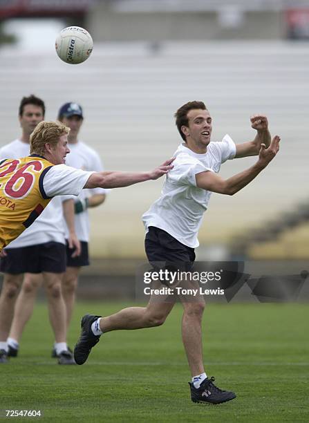 Essendon's Adam Ramanauskas handpasses at a training session for the Australian International Rules team which will play Ireland October 19 at...