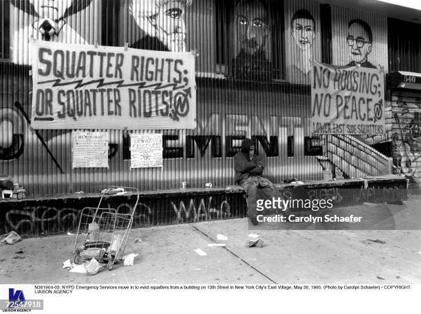 Emergency Services move in to evict squatters from a building on 13th Street in New York City's East Village, May 30, 1995.
