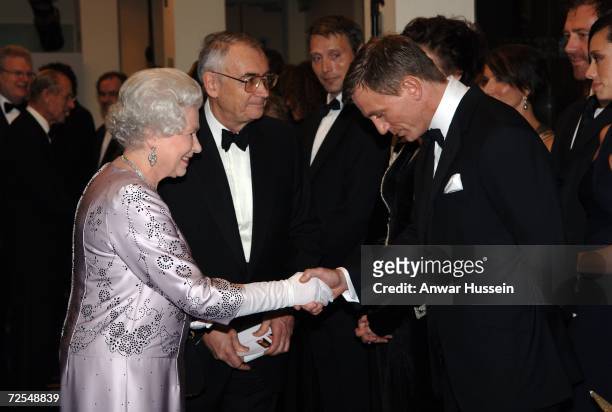 Queen Elizabeth ll shakes hands with Daniel Craig, the new James Bond, at the Royal Premiere for the 21st Bond film 'Casino Royale' at the Odeon...