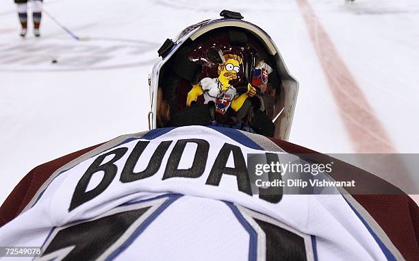 Detail of the facemask worn by goaltender Peter Budaj of the Colorado Avalanche as he warms up prior to the NHL game against the St. Louis Blues on...