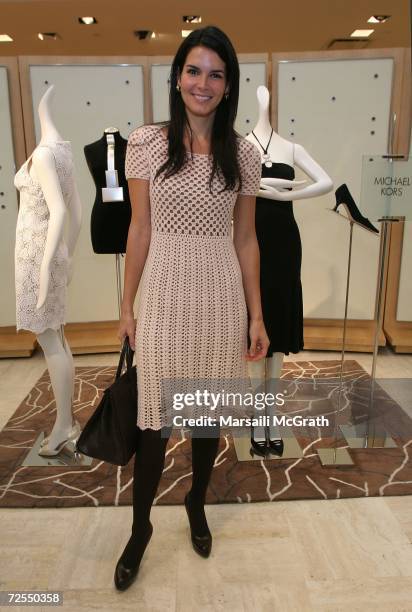 Actress Angie Harmon attends the Michael Kors in-store appearance and fashion show at Nieman Marcus on November 14 in Beverly Hills, California.