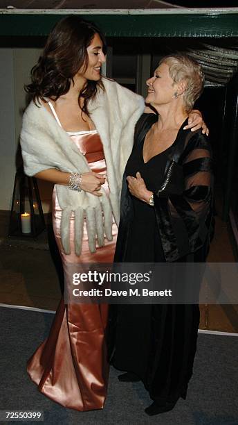 Actresses Caterina Murino and Dame Judi Dench attend the after party following the World premiere of the new James Bond film "Casino Royale" held at...