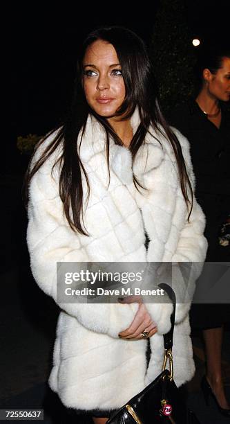 Actress Lindsay Lohan attends the after party following the world premiere of the new James Bond film "Casino Royale" held at Berkeley Square on...