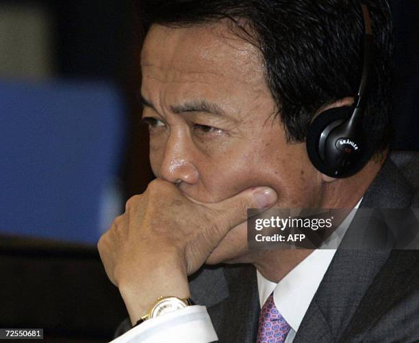 Japan's Foreign Minister Taro Aso is seen during the minister's retreat of the Asia-Pacific Economic Cooperation Summit in Hanoi 15 November 2006....