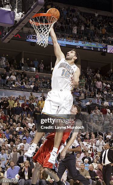 Peja Stojakovic of the New Orleans/Oklahoma City Hornets finishes off a layup against the Charlotte Bobcats on November 14, 2006 at the Ford Center...