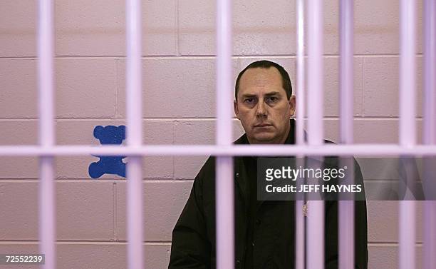 Buffalo, UNITED STATES: Dallas County Sheriff Mike Rackley stands in the hallway 14 November 2006 of his newly painted county jail with the color...
