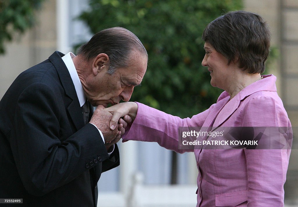 French President Jacques Chirac welcomes