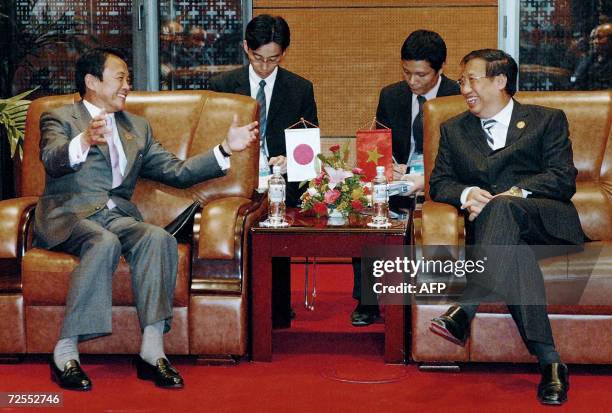 Japanese Foreign Minister Taro Aso meets Vietnamese deputy Prime Minister and Foreign Minister Pham Gia Khiem in a bilateral meeting at the National...