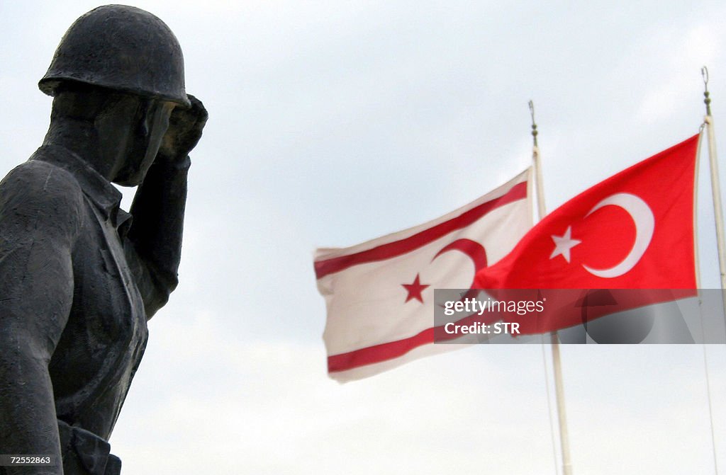 A soldier statue is seen with Turkish (R