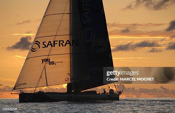 Pointe-a-Pitre, FRANCE : French sailor Marc Guillemot skipped his Imoca class monohull "Safran", 15 November 2006, as he arrives 7th at...