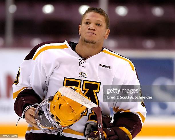 Freshman Kyle Okposo of the University of Minnesota Gophers gets ready for the opening face off against the St. Cloud State University Huskies on...