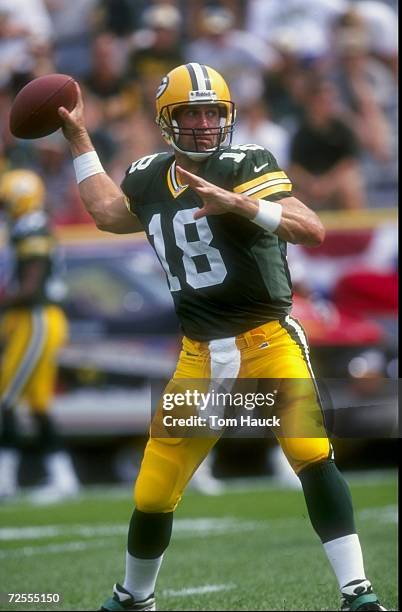 Quarterback Doug Pederson of the Green Bay Packers in action during the game against the Detroit Lions at Lambeau Field in Green Bay, Wisconsin. The...