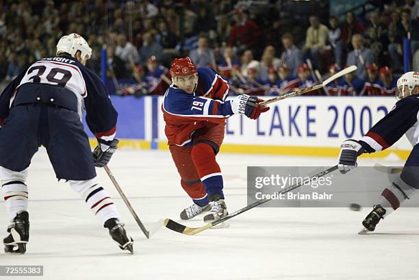 Alexei Yashin of Russia gets off a shot during the Salt Lake City Winter Olympic Games at the E Center in Salt Lake City, Utah. DIGITAL IMAGE....