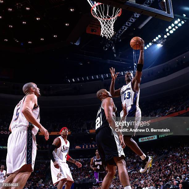 Michael Jordan of the Washington Wizards drives to the basket for a layup during the 2002 NBA All Star Game at the First Union Center in...