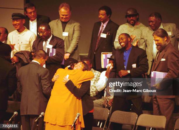 Sonia Jacob, facing, hugs Sabrina Butler at the National Conference on Wrongful Convictions and the Death Penalty November 14, 1998 in Chicago, IL....