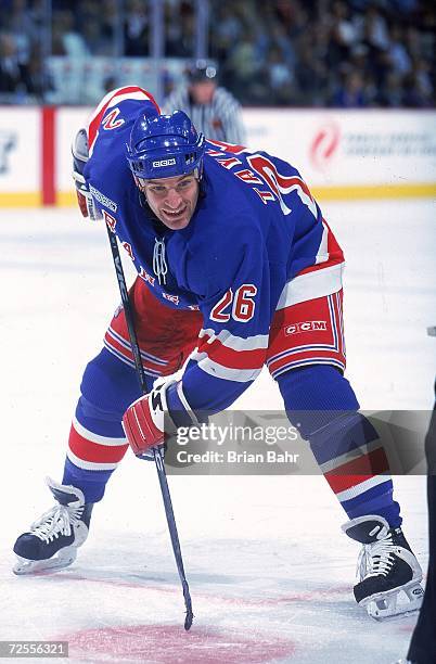 Tim Taylor of the New York Rangers waits on the ice during a game against the Colorado Avalanche at the Pepsi Center in Denver, Colorado. The...
