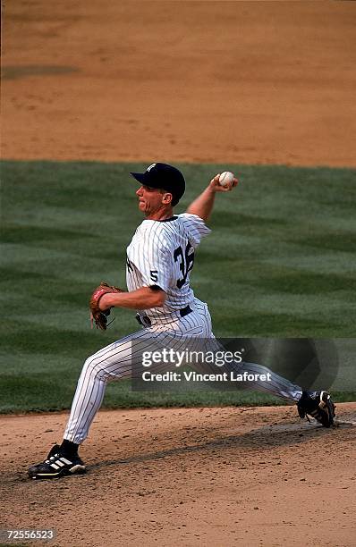 Pitcher David Cone of the New York Yankees throws the ball during the game against the Montreal Expos at Yankee Stadium in Bronx, New York. The...