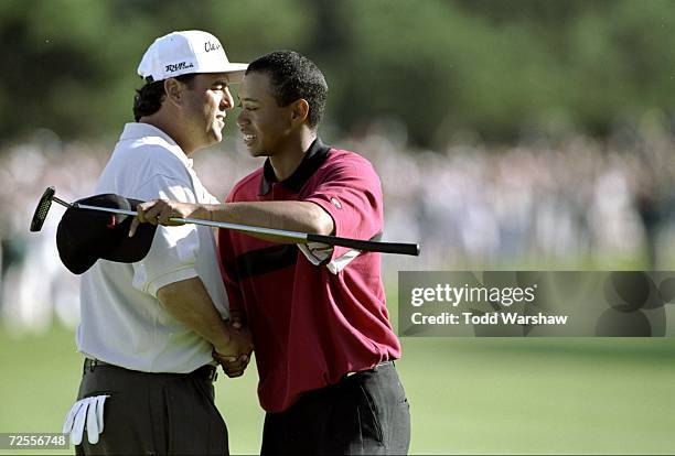 Tiger Woods hugs Billy Ray Brown after Tiger wins the Buick Invitational at the Torrey Pines Golf Course in La Jolla, California. Mandatory Credit:...